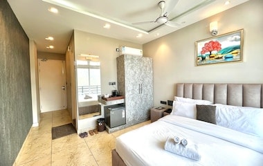 Deluxe Room interior with king bed